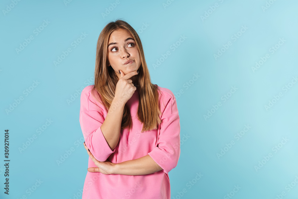 Portrait of a pensive young girl wearing pullower Portrait of a pensive young girl wearing pullower