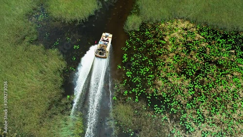 Airboat racing on a swamp river. Florida. USA.