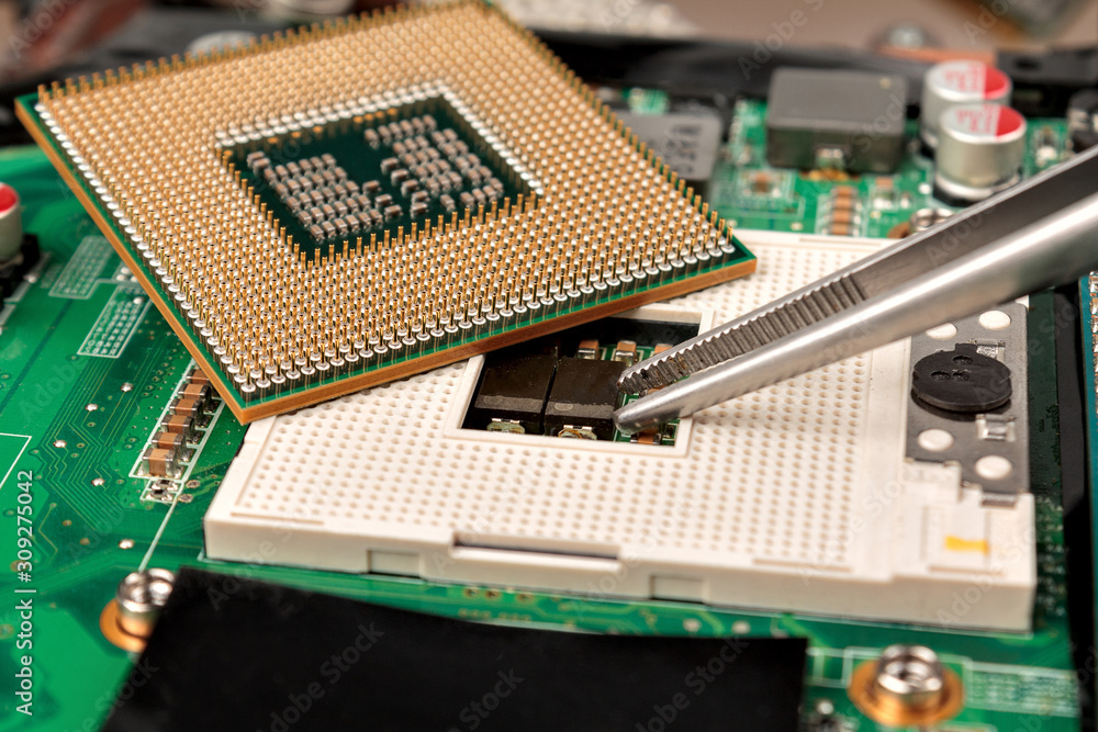 computer CPU close-up on the motherboard background, socket of central ...