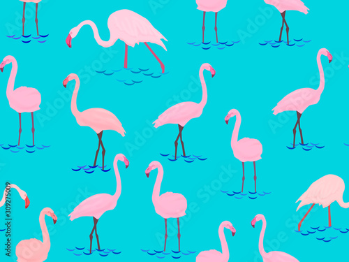 Seamless pattern with pink flamingo birds on a blue background.