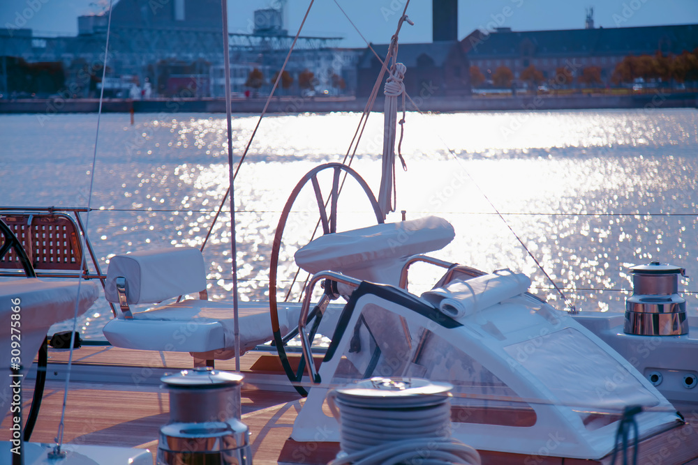 Obraz premium Luxury yacht tied to pier as symbol of travel and freedom.