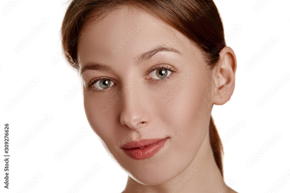 Beautiful young woman with clean fresh skin. Face treatment. Cosmetology, beauty and spa. Natural clear skin, close-up face Beautiful young woman with clean fresh skin. Face treatment. Cosmetology, beauty and spa. Natural clear skin, close-up face