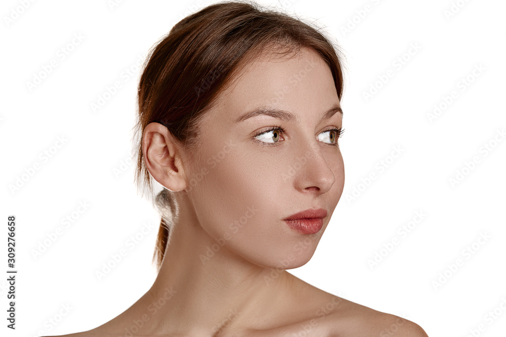 Beautiful young woman with clean fresh skin. Face treatment. Cosmetology, beauty and spa. Natural clear skin, close-up face Beautiful young woman with clean fresh skin. Face treatment. Cosmetology, beauty and spa. Natural clear skin, close-up face