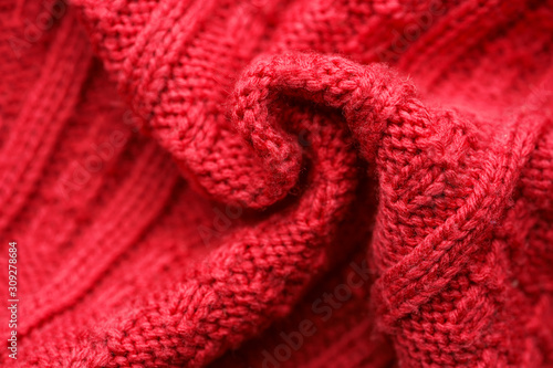 Red Knitted Sweater Background. Red pattern. Facial surface. Copy space