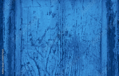 Classic blue color dark old wooden texture background. Concept color of the year 2020. Copy space. Grunge texture