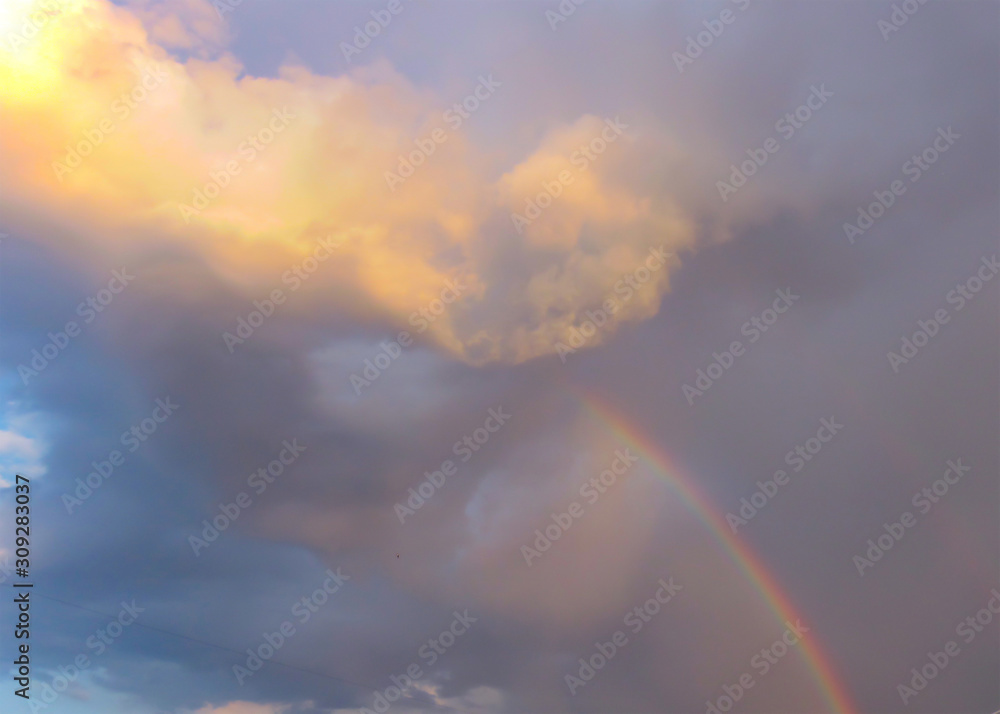 Mysterious cloud and rainbow in the sky, soft focus.