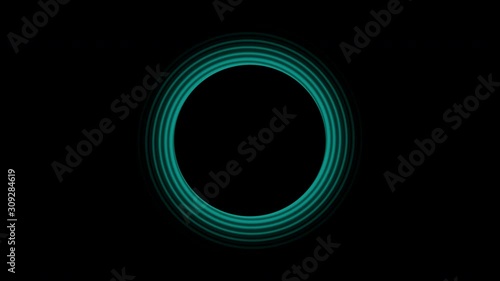 Glowing teal green rings spiral fading from a black center circle with a black background in a CGI high definition motion video clip