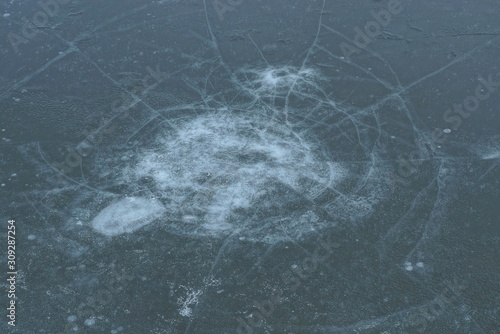 natural texture of gray ice and white cracks