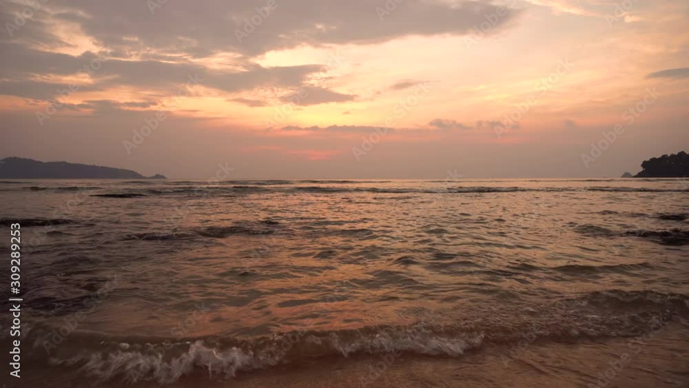 Beautiful tropical beach with sunset sky and white cloud background. Summer vacation and nature environment concept. Beautiful tropical beach with sunset sky and white cloud background. Summer vacation and nature environment concept.