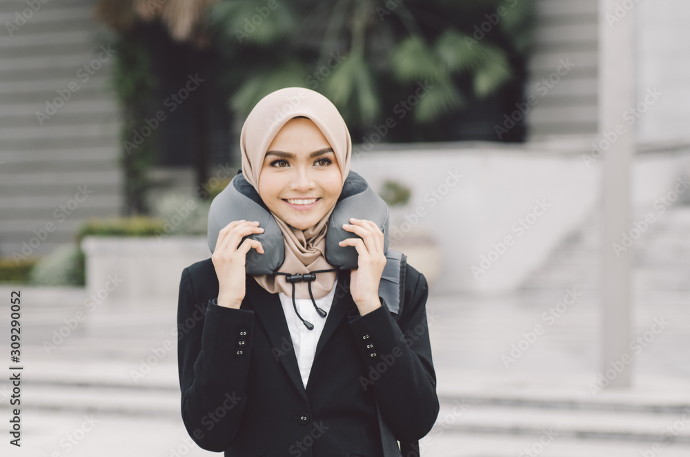 Fototapeta premium young executive businesswoman in black suit standing with confident face expression