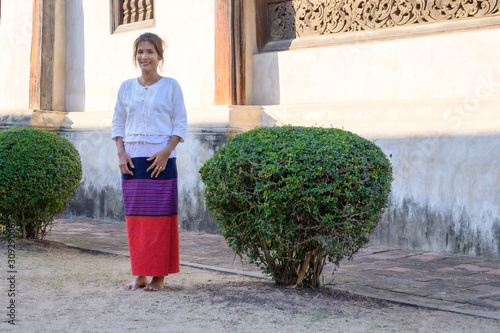 Thai woman with Lanna style background photo