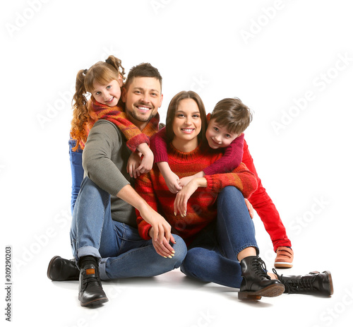 Happy family in winter clot...