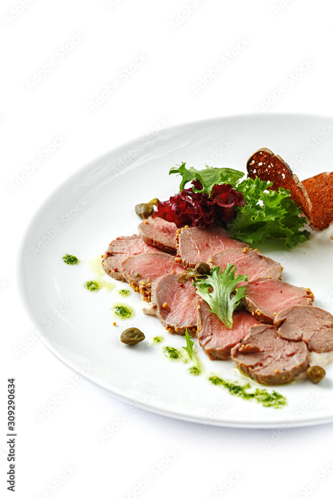 Dishes of traditional Russian cuisine. Restaurant serving. Black background.