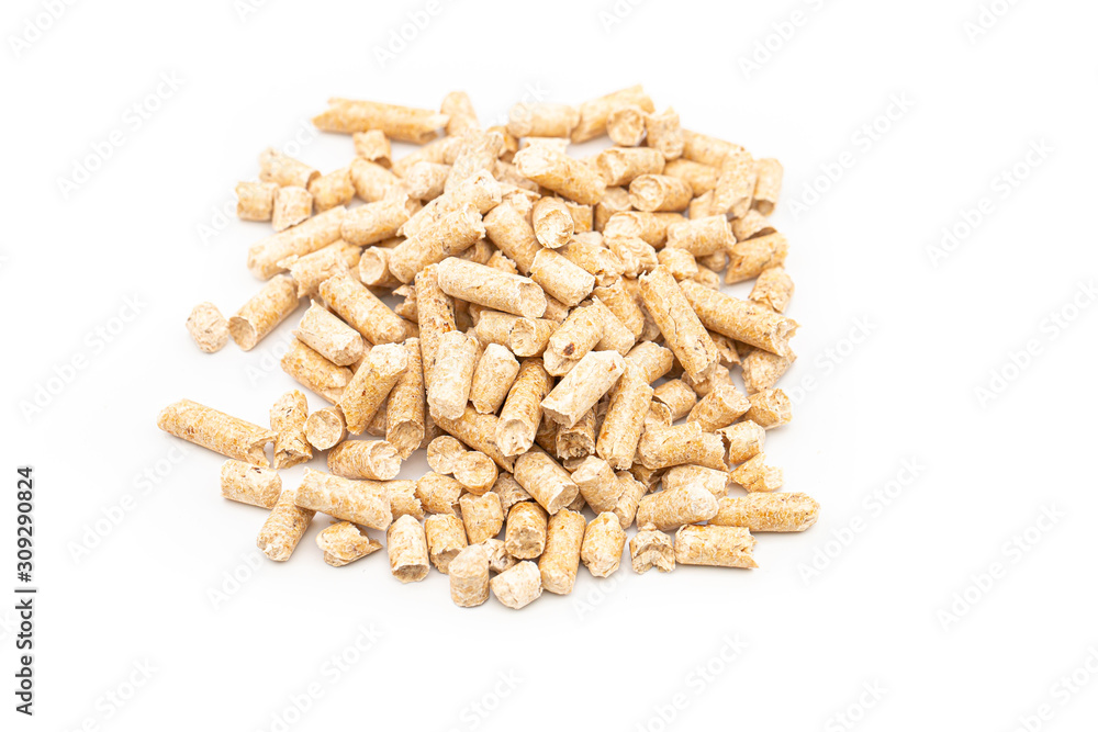 Close up compressed wood pellets for use as an eco-friendly renewable organic biofuel over a white background. Eco-friendly renewable fuel concept Close up compressed wood pellets for use as an eco-friendly renewable organic biofuel over a white background. Eco-friendly renewable fuel concept