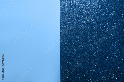 Color blue papers background with glitter. Trendy colour. photo