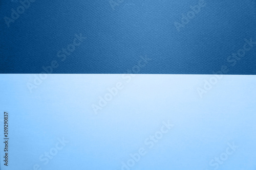 Color blue papers background with glitter. Trendy colour.