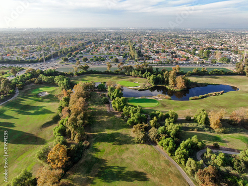 Aerial view over golf field. Large and green turf golf course in South California. USA