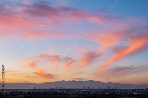 Sunset aerial view of the strip with mountain behind © Kit Leong