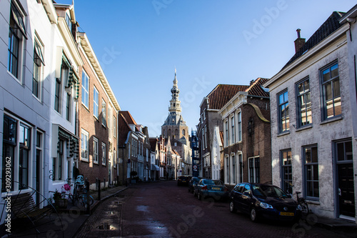 Zierikzee, Netherlands - December 6, 2019 - View on old Dutch houses and tower of City Museum in Zierikzee, historical town in province Zeeland, Netherlands