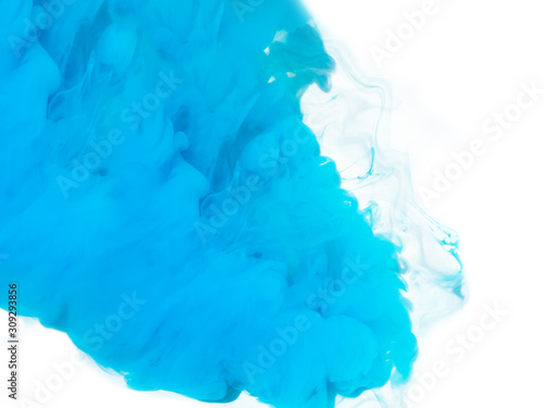 white and blue paint dissolve in water on a white background
