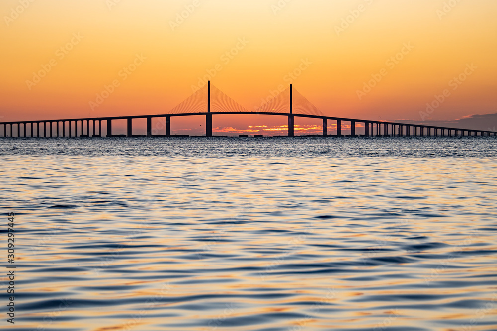 Dawn  at the bridge with peaceful waters at sunrise