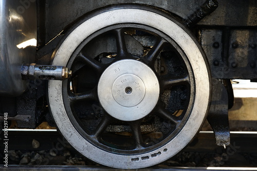 Bangkok,Thailand-December 5, 2019: Driving wheels and coupling rods on a steam locomotive made in Japan