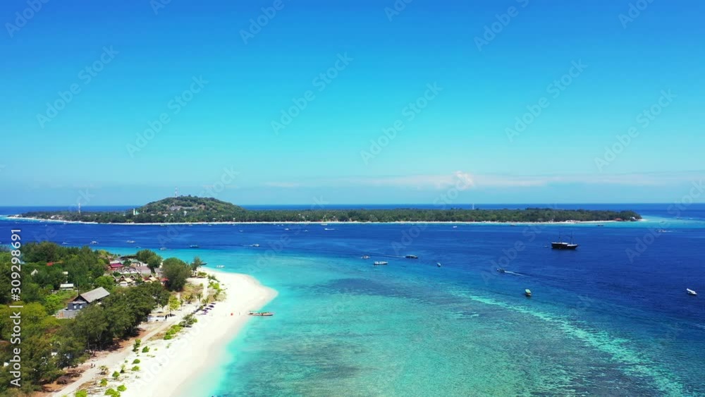 Paradise exotic beaches of tropical islands with lush vegetation in Indonesia, surrounded by calm clear water of blue turquoise sea where boats sailing Paradise exotic beaches of tropical islands with lush vegetation in Indonesia, surrounded by calm clear water of blue turquoise sea where boats sailing