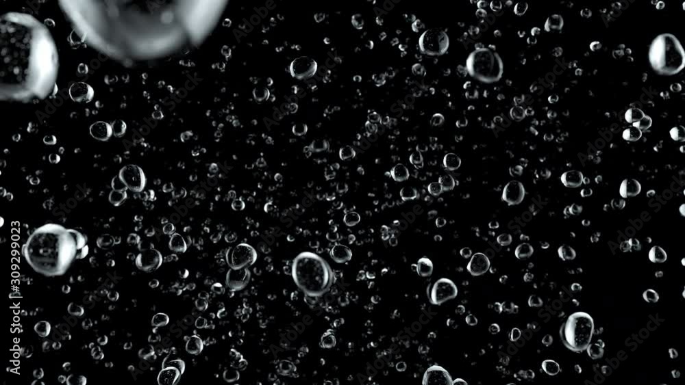 Top View of Bubbles Raising Up on Black Background in Super Slow Motion Top View of Bubbles Raising Up on Black Background in Super Slow Motion