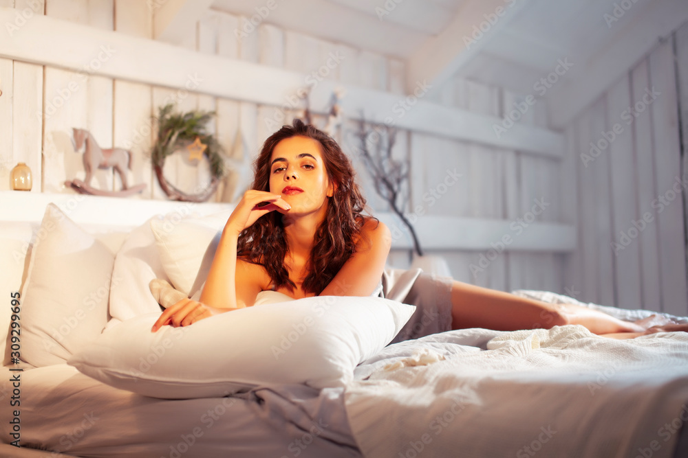 young pretty woman in bed at morning cozy interior, lifestyle people concept