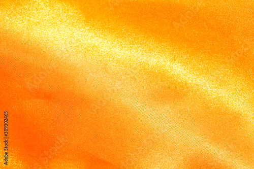 streak of golden fabric abstract background