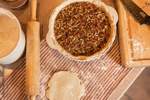 Baking a fresh homemade pecan pie for the Holidays