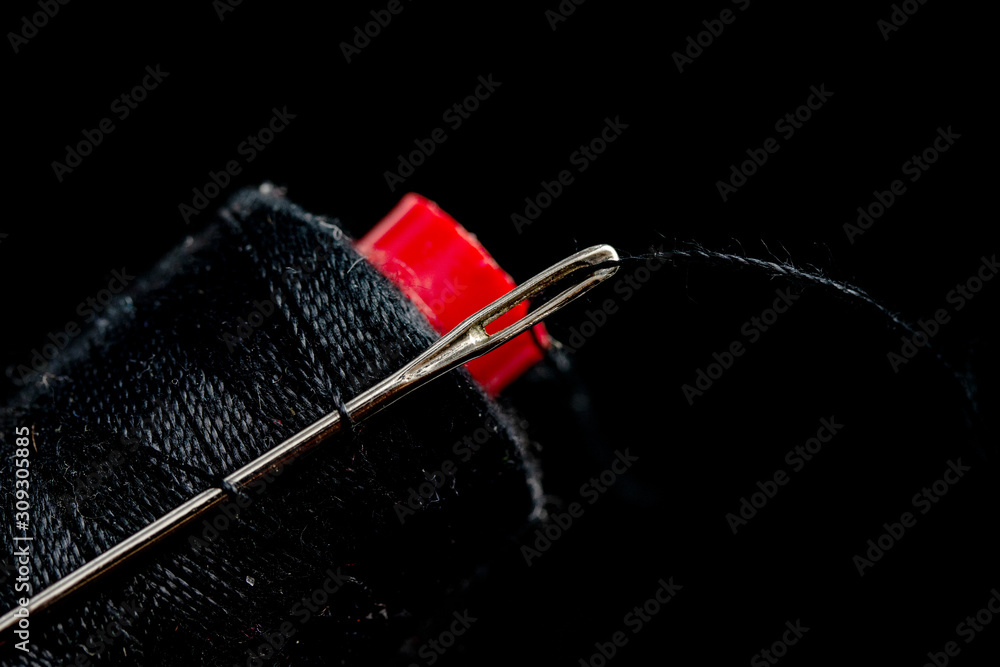 black thread in the eye of a needle black thread in the eye of a needle