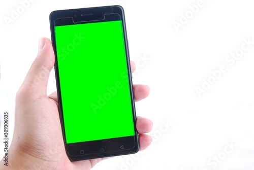 Mock up image of casual man using blank screen mobile smart phone on white background. It can be used for application advertisement or web design template