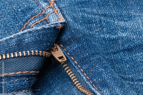 Close-up,Zipper on the blue demin jeans photo