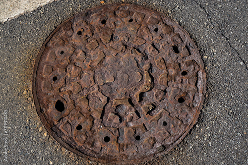 Rusty manhole cover