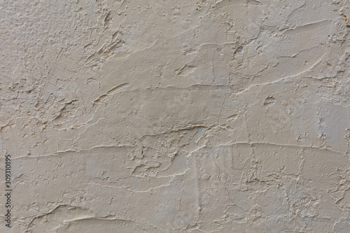 YELLOW PAINT WALL WITH CEMENT ROUGH SURFACE, BACKGROUND