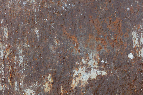 ROUGH RUSTY METAL SURFACE PAINTED IN CRACKED GRAY PAINT, BACKGROUND
