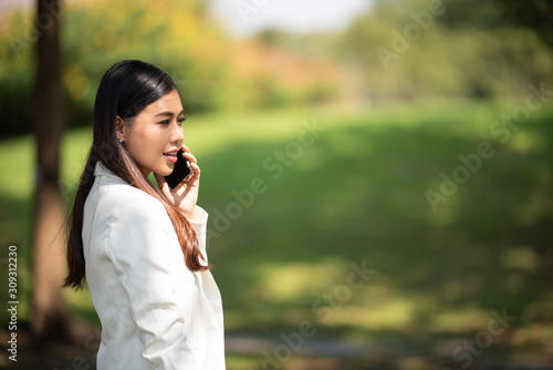 businesswomen using smartph...