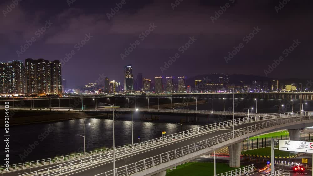 Macau traffic cityscape night timelapse pan up Macau traffic cityscape night timelapse pan up