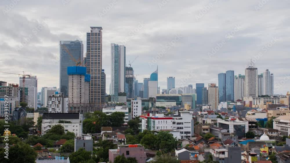Timelapse of Jakarta city panorama early in the morning. Indonesia. Timelapse of Jakarta city panorama early in the morning. Indonesia.
