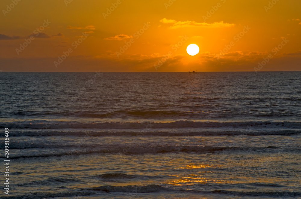 Beautiful sunset of the Arabian Sea in India 