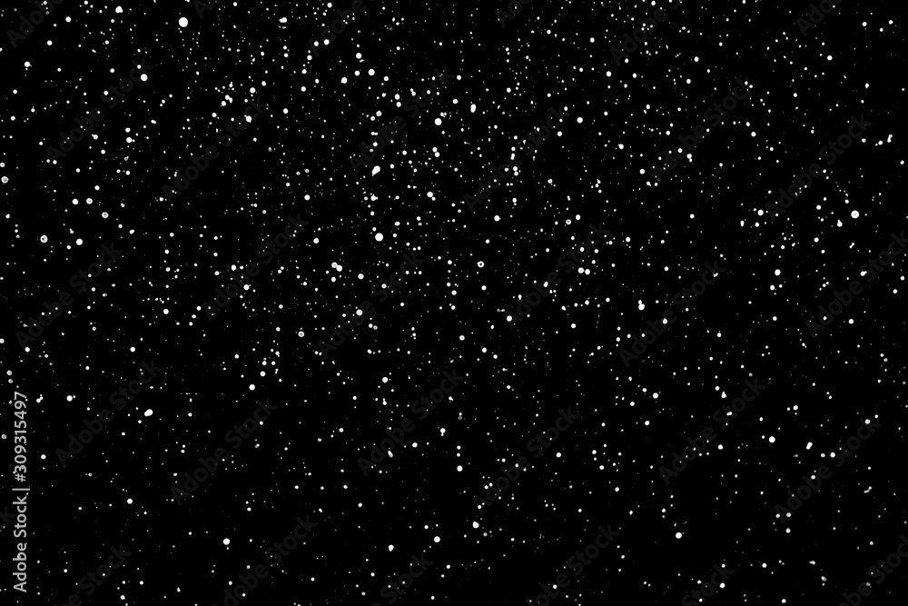 Chaotic white star bokeh on a isolated black background. falling blurry bokeh snow overlay, starry sky. white spots on black background, white drops and spots. abstraction. Chaotic white star bokeh on a isolated black background. falling blurry bokeh snow overlay, starry sky. white spots on black background, white drops and spots. abstraction.