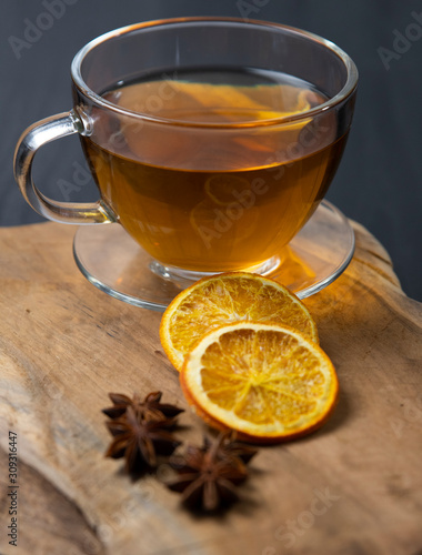 A warm cup of tea with orange and anise ,herbal tee