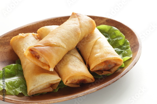Chinese food, spring roll on wooden plate