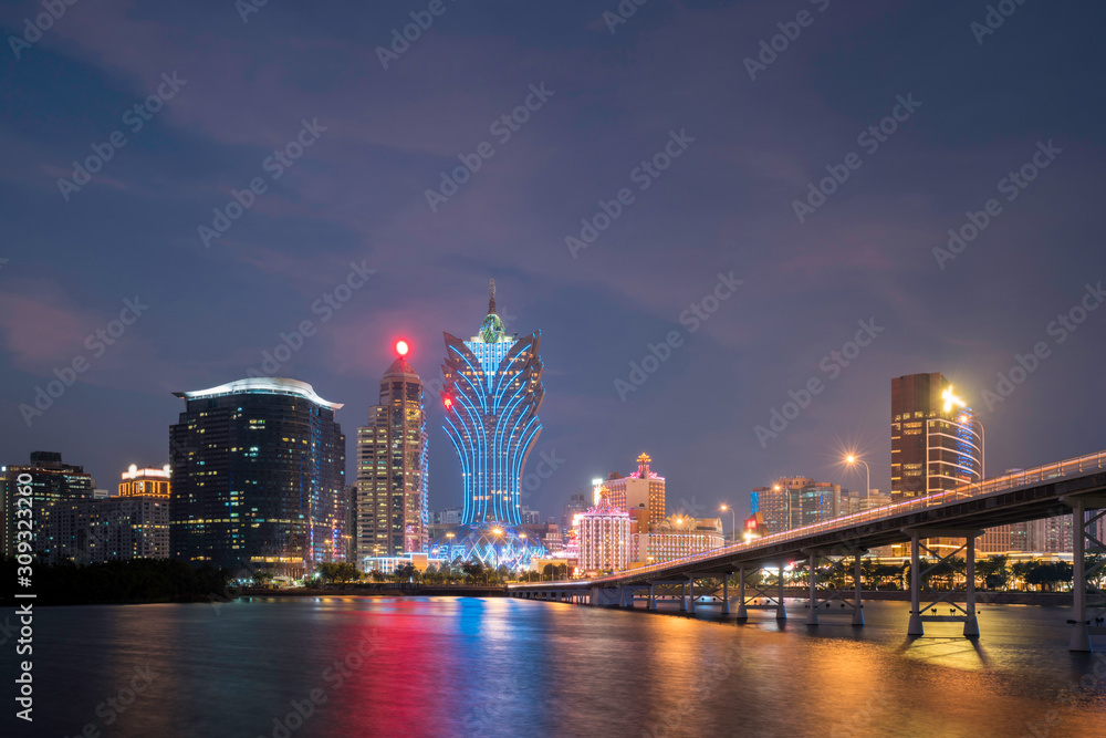 Obraz premium Image of Macau (Macao), China. Skyscraper hotel and casino building at downtown in Macau (Macao). Asian tourism, modern city life, or business finance and economy concept