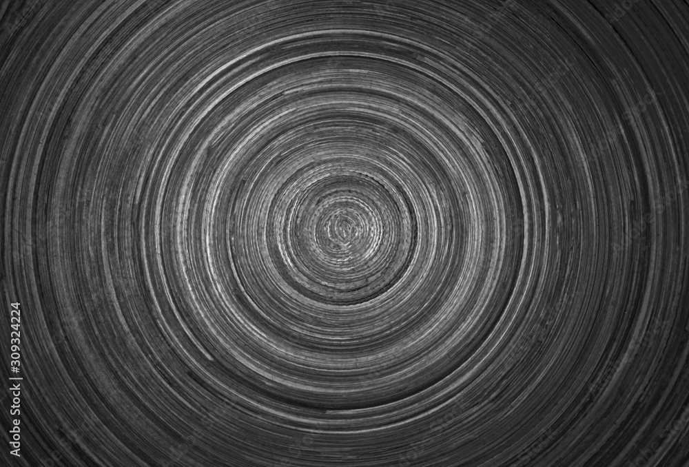 Fototapeta premium Circular background texture of dark wood