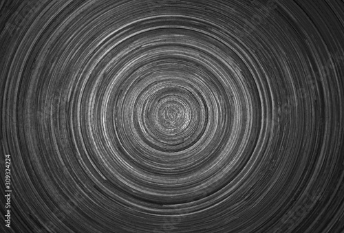 Circular background texture of dark wood © slay19