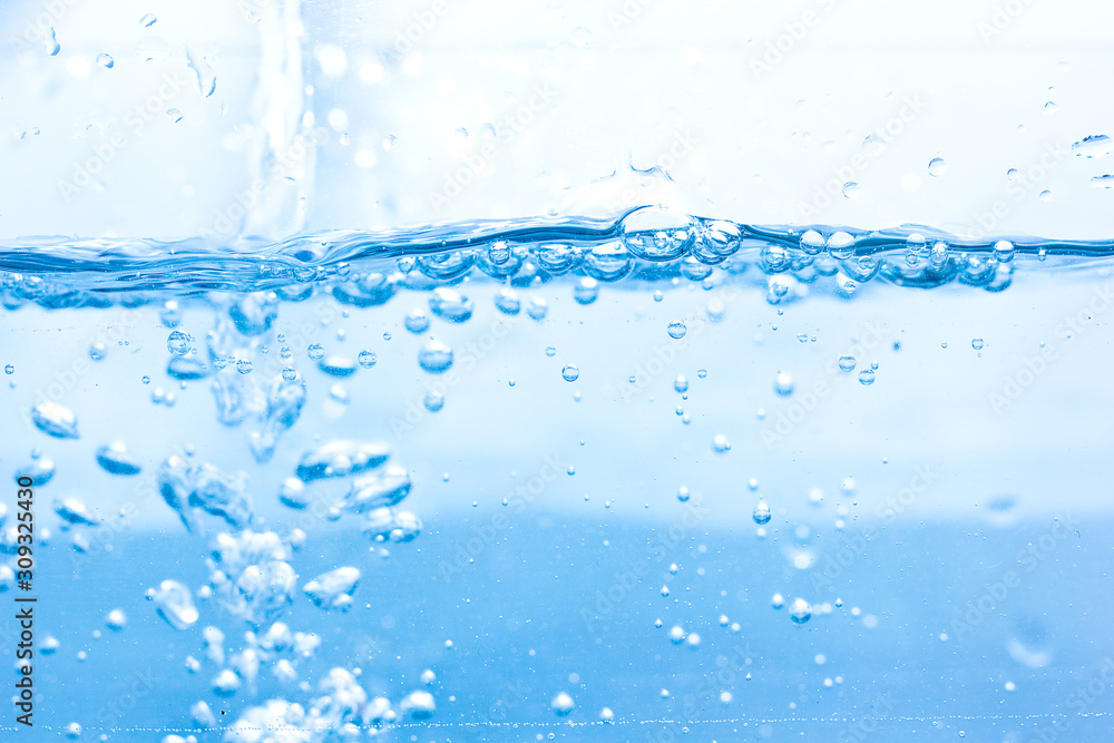 The water moving in waves is blue The water moving in waves is blue