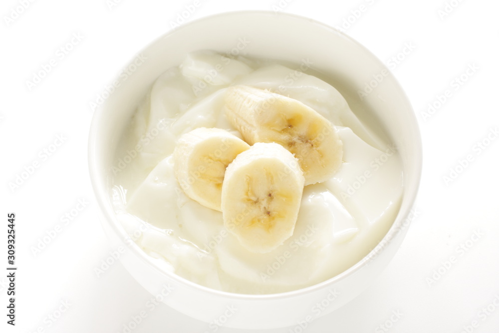 Banana and honey on yogurt for healthy breakfast Banana and honey on yogurt for healthy breakfast
