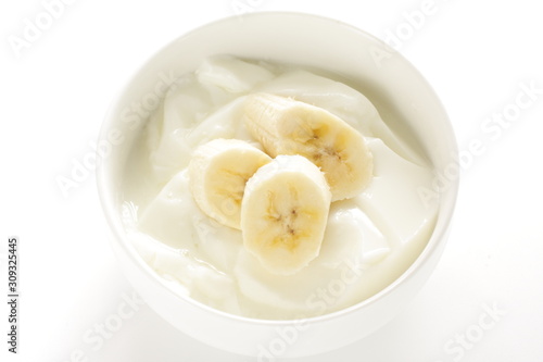 Banana and honey on yogurt for healthy breakfast